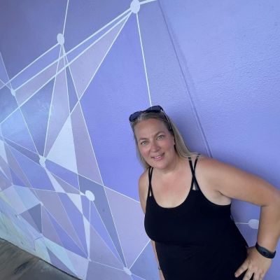 Posting at the famous 'purple wall' at the Magic Kingdom